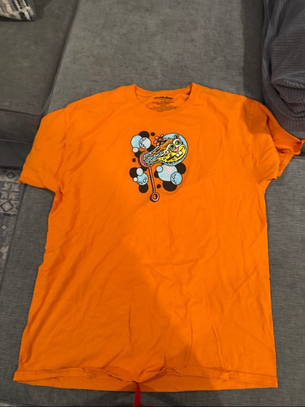 Nickelodeon Orange Short Sleeve Tee with Colorful Cartoon Graphic